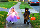Happy trick or treaters on Halloween.
Image of Happy trick or treaters on Halloween.