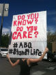 A protester holds a sign during a prayer rally for life. Image of A protester holds a sign during a prayer rally for life.