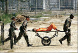 A new report alleges that medical professionals participated willingly in the torture of terror detainees. Image of A new report alleges that medical professionals participated willingly in the torture of terror detainees.