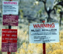 Various signs warn would-be visitors away. None refer to Area 51 itself, but rather Nellis AFB. Image of Various signs warn would-be visitors away. None refer to Area 51 itself, but rather Nellis AFB.
