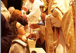 Receiving the Eucharist. Image of Receiving the Eucharist.