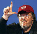 Michael Moore is playing his part on cue. Image of Michael Moore is playing his part on cue.