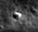 This mysterious object hasn't been explained by NASA. It appears to be artificial in origin because of the pattern of light on its backside. Image of This mysterious object hasn't been explained by NASA. It appears to be artificial in origin because of the pattern of light on its backside.
