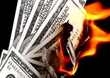 Currency printed out of thin air with nothing to back it devalues the dollar. Image of Currency printed out of thin air with nothing to back it devalues the dollar.