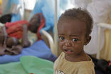 A hungry child weeps. Such scenes may become more common not less by 2050. Image of A hungry child weeps. Such scenes may become more common not less by 2050.