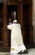 Pope Francis kneels before an ordinary priest to make his confession. Image of Pope Francis kneels before an ordinary priest to make his confession.