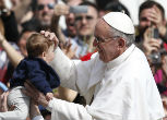 Pope Francis follows the example of St. Joseph, and blesses a child. Our clergy are father figures too. Image of Pope Francis follows the example of St. Joseph, and blesses a child. Our clergy are father figures too.
