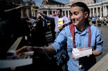Bibles were handed out to all visitors regardless of their religious affiliation. Image of Bibles were handed out to all visitors regardless of their religious affiliation.