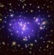 Galaxy clusters such as these should be more common throughout the universe than they are. Image of Galaxy clusters such as these should be more common throughout the universe than they are.