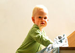 Babies are draw to stairs like a magnet.
Image of Babies are draw to stairs like a magnet.