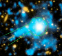 This image from Caltech shows a filament of gas streaming towards a quasar, which is a supermassive, energetic black hole at the center of a galaxy. Image of This image from Caltech shows a filament of gas streaming towards a quasar, which is a supermassive, energetic black hole at the center of a galaxy.