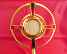 The Eucharist is: Jesus truly present - Body, Blood, Soul, and Divinity! Image of The Eucharist is: Jesus truly present - Body, Blood, Soul, and Divinity!