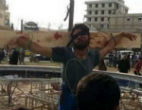 ISIS uses crucifixion as a public way of insulting those accused of disloyalty. Image of ISIS uses crucifixion as a public way of insulting those accused of disloyalty.