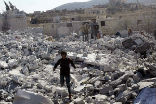 Civilians inspect the rubble of a building destroyed by Allied airstrikes in Syria. We cannot bomb our way into the hearts of people. Image of Civilians inspect the rubble of a building destroyed by Allied airstrikes in Syria. We cannot bomb our way into the hearts of people.