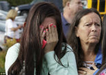 Kids and parents react to news of the shooting. Image of Kids and parents react to news of the shooting.