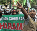 Indonesian Muslims demonstrate against Christians on Christmas. Image of Indonesian Muslims demonstrate against Christians on Christmas.