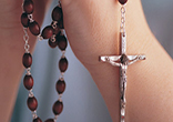 Praying the Rosary enables us to accept God's grace and follow His commands with ease. Image of Praying the Rosary enables us to accept God's grace and follow His commands with ease.