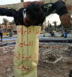 A crucifixion in the Islamic State. Image of A crucifixion in the Islamic State.