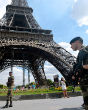 Soldiers guard several sites in Paris as the threat of terror attacks grows. Image of Soldiers guard several sites in Paris as the threat of terror attacks grows.