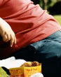 Laziness can lead to problems with being overweight. Image of Laziness can lead to problems with being overweight.