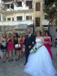 Couple weds despite their church being in ruins. Image of Couple weds despite their church being in ruins.