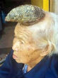 Liang Xiuzhen, 87, and her Image of Liang Xiuzhen, 87, and her