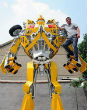 Wang Liansheng stands on his 16-foot-tall model of autobot Bumblebee.
Image of Wang Liansheng stands on his 16-foot-tall model of autobot Bumblebee.