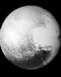 New images of Pluto give scientists puzzling clues. Image of New images of Pluto give scientists puzzling clues.