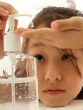 Childrens' use of hand sanitizer should be monitored by adults. Image of Childrens' use of hand sanitizer should be monitored by adults.