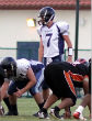 A football coach is under investigation due to prayers during and after their football games. Image of A football coach is under investigation due to prayers during and after their football games.