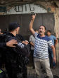 Protesters fought authorities at holy site. Image of Protesters fought authorities at holy site.