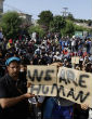 Refugees in Lesbos live in squalor while waiting to be registered. Image of Refugees in Lesbos live in squalor while waiting to be registered.