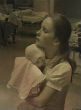 Nurse Susan Berger holds infant Amanda Scarpinati (WTEN-TV). Image of Nurse Susan Berger holds infant Amanda Scarpinati (WTEN-TV).