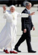 Pope Benedict XVI wearing the iconic red shoes. Image of Pope Benedict XVI wearing the iconic red shoes.
