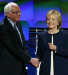 Sanders and Clinton appeared to be friends rather than adversaries during their debate in Las Vegas. Neither candidate went on the offensive against one another (CNN). Image of Sanders and Clinton appeared to be friends rather than adversaries during their debate in Las Vegas. Neither candidate went on the offensive against one another (CNN).