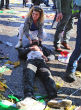A woman cries over a victim. Image of A woman cries over a victim.