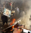 Pakistani Muslims burn an image of Our Lady during one of their riots against Christians. Image of Pakistani Muslims burn an image of Our Lady during one of their riots against Christians.