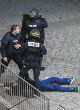 SWAT and security forces raided a Saint-Denis apartment. Following the 6-hour firefight, two terrorists are dead and seven are in custody (AP). Image of SWAT and security forces raided a Saint-Denis apartment. Following the 6-hour firefight, two terrorists are dead and seven are in custody (AP).