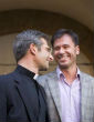 Krzysztof Charamsa and his boyfriend Eduardo smile at each other after former-Vatican priest Charamsa admitted his sexual orientation. Image of Krzysztof Charamsa and his boyfriend Eduardo smile at each other after former-Vatican priest Charamsa admitted his sexual orientation.