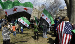 Syrian immigrants protest in favor of allowing refugees into the country. Each year, thousands of Syrians enter the USA by perfectly legal means, but none are adequately screened for terrorist ties. Image of Syrian immigrants protest in favor of allowing refugees into the country. Each year, thousands of Syrians enter the USA by perfectly legal means, but none are adequately screened for terrorist ties.