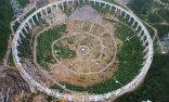 China's 500-meter Aperture Spherical Radio Telescope requires the displacement of 9,110 people to prevent interference with its operations. Image of China's 500-meter Aperture Spherical Radio Telescope requires the displacement of 9,110 people to prevent interference with its operations.