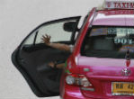 A pair of men entered a taxi cab and began kissing, in front of the Muslim driver. Image of A pair of men entered a taxi cab and began kissing, in front of the Muslim driver.