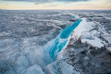 Greenland's ice sheet has begun melting early, alarming scientists. Image of Greenland's ice sheet has begun melting early, alarming scientists.
