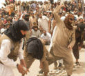 Fanatic men enthusiastically participate in the execution. Image of Fanatic men enthusiastically participate in the execution.