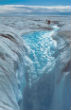 Researchers survey melting on Greenland. Image of Researchers survey melting on Greenland.