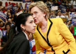 Clinton's promotion of Abedin reveals she cares little about the people she claims to care about. Image of Clinton's promotion of Abedin reveals she cares little about the people she claims to care about.