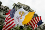 With 20 percent of the population, Catholics represent a major voting bloc in the United States. Image of With 20 percent of the population, Catholics represent a major voting bloc in the United States.