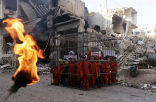 According to one woman, ISIS allegedly baked six men to death and killed 250 children in a dough machine. Many others were thrown from a balcony and some shot. ISIS routinely practices horrific killings to discourage resistance. Image of According to one woman, ISIS allegedly baked six men to death and killed 250 children in a dough machine. Many others were thrown from a balcony and some shot. ISIS routinely practices horrific killings to discourage resistance.