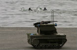 The Russian terminator robot, shown here during an exercise, is designed for counter-terrorism operations. Image of The Russian terminator robot, shown here during an exercise, is designed for counter-terrorism operations.