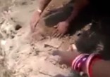 baby girl's feet were found sticking up from the earth. Image of baby girl's feet were found sticking up from the earth.